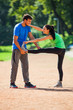 © djoronimo - Young couple stretching their bodies, warming up for jogging.