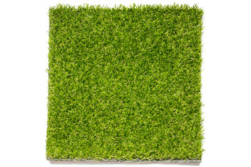 Artificial green grass plate on white background