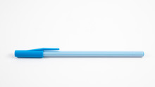 The Close Up Of Blue Stripe Pattern Ballpoint Pen With Blue Pen Cap.