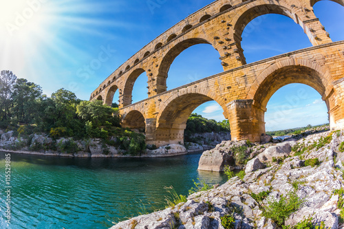 Fotografie, Obraz Aqueduct Pont du Gard. Photo taken fisheye lens