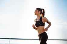 Picture Of Young Attractive Fitness Girl Jogging