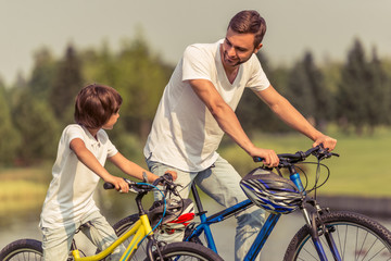 Wall Mural - Dad and son cycling