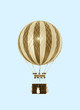 Old fashioned helium balloon on blue sky