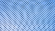 Green Seamless Fence Chain, Iron Wire Fence On Blue Sky Background