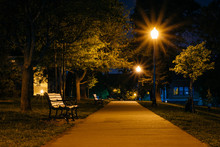 Bench And Walkway At Federal Hill Park At Night, In Baltimore, M