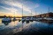 Boats docked in a marina at sunset in Canton, Baltimore, Marylan