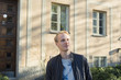 © FOLIO - Young man standing outdoors