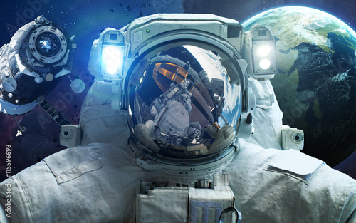 Plakat Astronauta w kosmosie. Spacewalk. Elementy tego obrazu dostarczone przez NASA