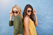 © Jacob Lund - Two young girl friends in sunglasses having fun