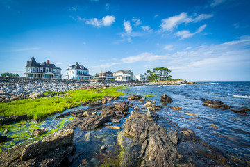 Rocky coast and beachfront homes at Concord Point, in Rye, New H