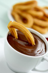 Wall Mural - churros con chocolate, a typical Spanish sweet snack