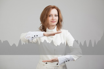 Young woman working with graph chart. Future technologies for busines, stock market concept