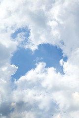 Wall Mural - Clouds on a shiny blue sky