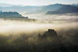 Fototapeta Natura - Misty morning over Biertan village, Transylvania, Romania