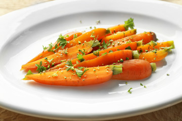 Wall Mural - Plate of sliced baby carrot with herbs closeup