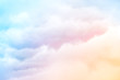 © DavidMSchrader - Rainbow Clouds.  A soft cloud background with a pastel colored orange to blue gradient.