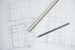 © worldwide_stock - black pencil on architectural drawing paper and rolls for construction