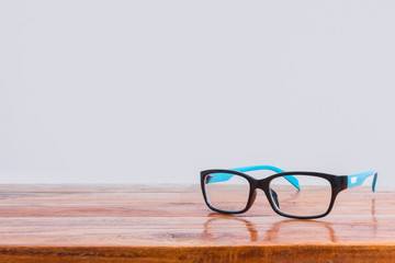 Glasses on a wooden floor.