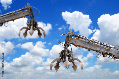 Fotografia, Obraz Clamshell and Hydraulic crane with blue sky