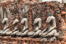 Row Of Ruin Buddha Statue In Wat Chai Wattanaram, Ayutthaya, Tha