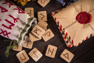 Wall Mural - Bunch Of Dried Herb That Usually Is Used In Different Ritual, Magic And Cleaning, runes, old envelope with wax stamp  candle