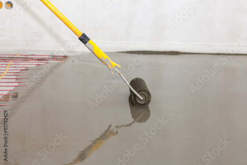 Electric Floor Heating System Installation In New House Roller