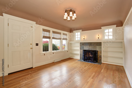 Empty Living Room Interior With Mocha Ceiling And Tile Trim