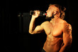 © kazanovskyiphoto - Young handsome muscular man with bottle of water
