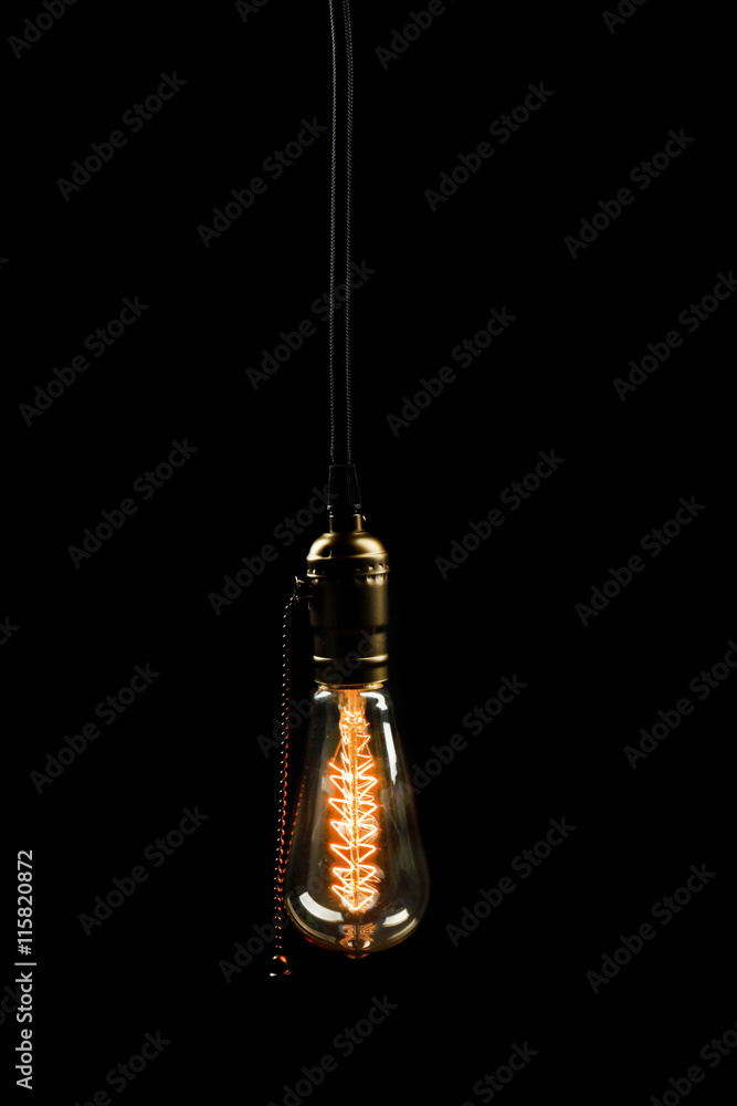 Light bulb on black background, close up