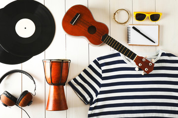 Wall Mural - Musician set on white wooden background