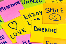 Slow Down, Relax, Take It Easy, Keep Calm, Love, Meditate, Go Outside, Enjoy Life, Be Positive, Have Fun, Unplug, Breathe And Other Motivational Lifestyle Reminders On Colorful Sticky Notes