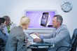 © vectorfusionart - Composite image of colleagues speaking about work