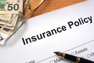 Poster - Paper with words insurance policy form and money.