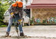 Workers use Concrete Breaker Electric