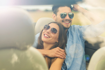 Wall Mural - Couple enjoying a road trip together 
