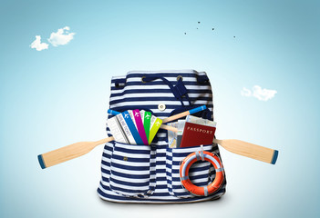 Wall Mural - striped sea bag with oars and plane tickets