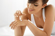 © puhhha - Woman Hand Cream. Close Up Of Beautiful Girl Applying Lotion