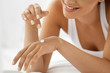 © puhhha - Woman Hand Cream. Close Up Of Beautiful Girl Applying Lotion