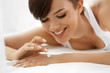 © puhhha - Woman Hand Cream. Close Up Of Beautiful Girl Applying Lotion