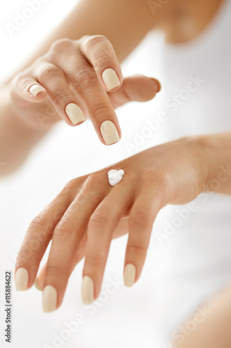 Poster Hand Cream. Close Up Of Woman's Hands Applying Lotion On Skin