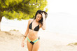 © BGStock72 - Young woman in bikini on the beach