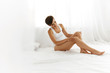 © puhhha - Beauty Body Woman. Beautiful Girl Touching Epilated Long Legs