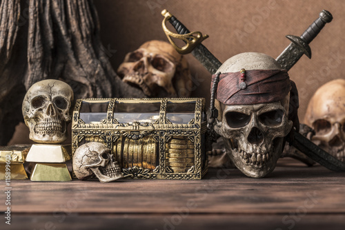 pirate skull and human skeleton with gold and treasure coffer halloween conce...