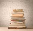 © ra2 studio - A pile of books with math formulas written in doodle style