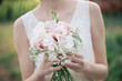© Laszlo - Bride holding wedding bouquet
