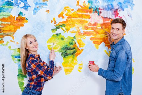 Get Time For Creative Beautiful Young Couple Painting Map Of The For iPhone Free Get Wallpaper Time For Creative Beautiful Young Couple Painting Map Of The For Android Free