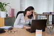 Picture of an exhausted office worker at desk