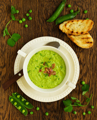 Wall Mural - Soup of green peas with bacon and mint.