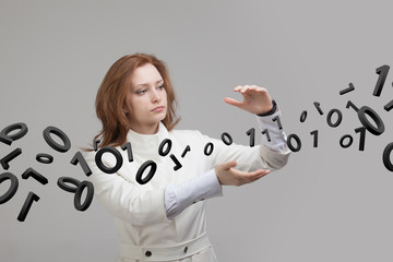 woman working with binary code, concept of digital technology.