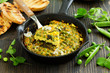 Frittata with green peas and spinach.